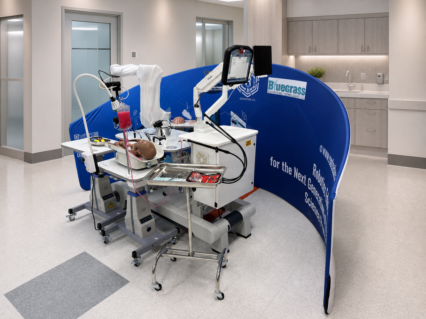 CARE healthcare robotics training system in a modern hospital simulation lab with collaborative robot, clinical simulation equipment, cameras, and operator controls